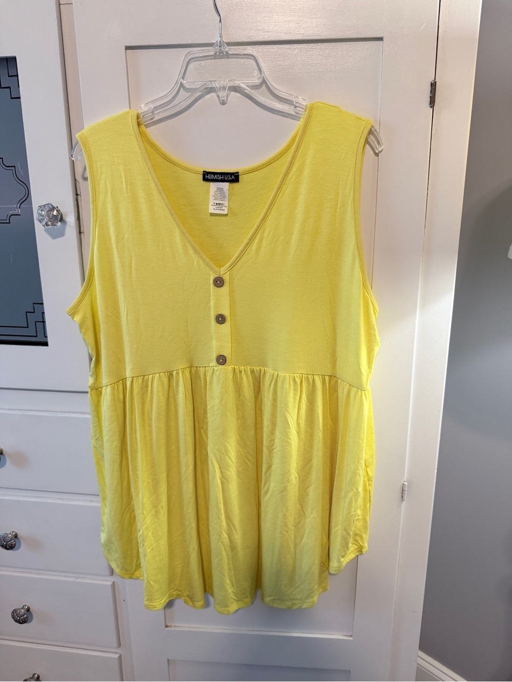 Hemish  Sleeveless V-Neck Yellow Button-Front Peplum Tunic